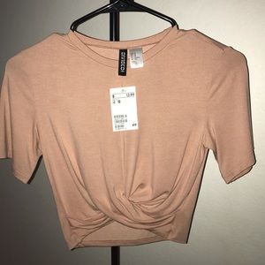 Salmon colored crop top short sleeved